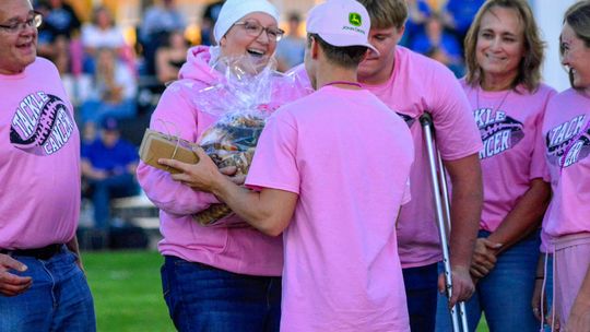 Long-time teacher and coach Jackie Rahmig was honored by the Bridgeport Bulldog family at the final football game of the season on Friday