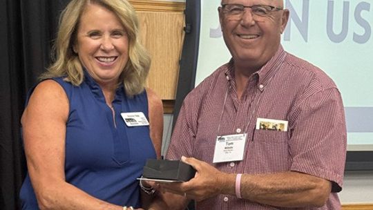Millette receives achievement award