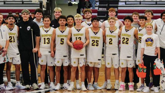 Schluterbusch, Nein hit milestones as Bulldogs finish second in tourney