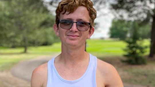 Varner wins cross country title in Kimball; Bulldog golfers compete at Mitchell Invite