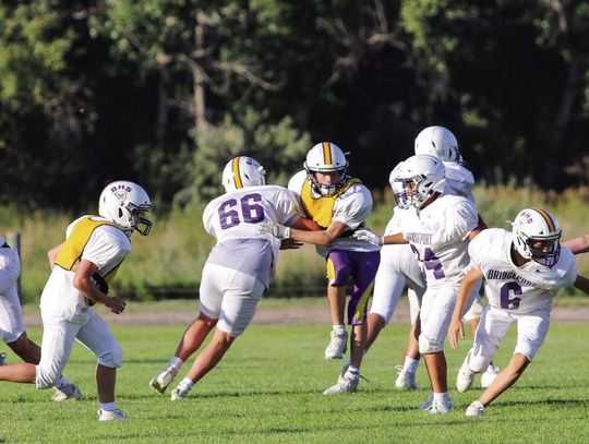 Bridgeport football and volleyball teams scrimmage