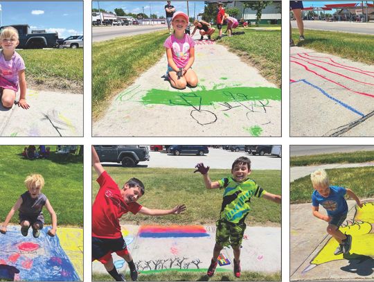 Creating chalk drawings on Saturday were