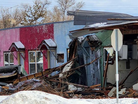 It was an early wake up call for a semi-truck driver who plowed through part of the building at the long empty Lazy U Motel in Broadwater early Tuesday morning.