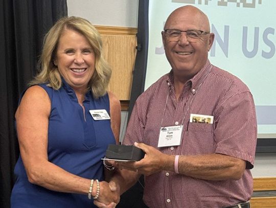 Millette receives achievement award