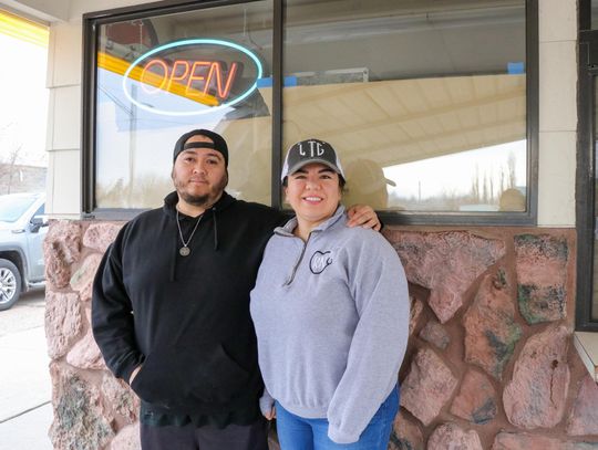 New owners Miguel Torres and Susana Lopez stand in front of Bridgeport’s iconic Karette drive-in on Main Street