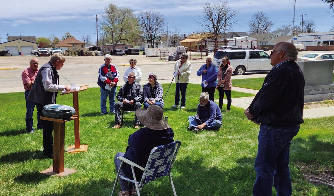 A small group gathered on the Morrill County courthouse lawn 