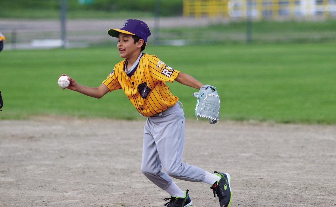 Eight and under machine pitch Gold team