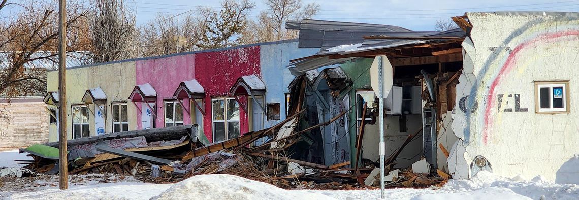 It was an early wake up call for a semi-truck driver who plowed through part of the building at the long empty Lazy U Motel in Broadwater early Tuesday morning.