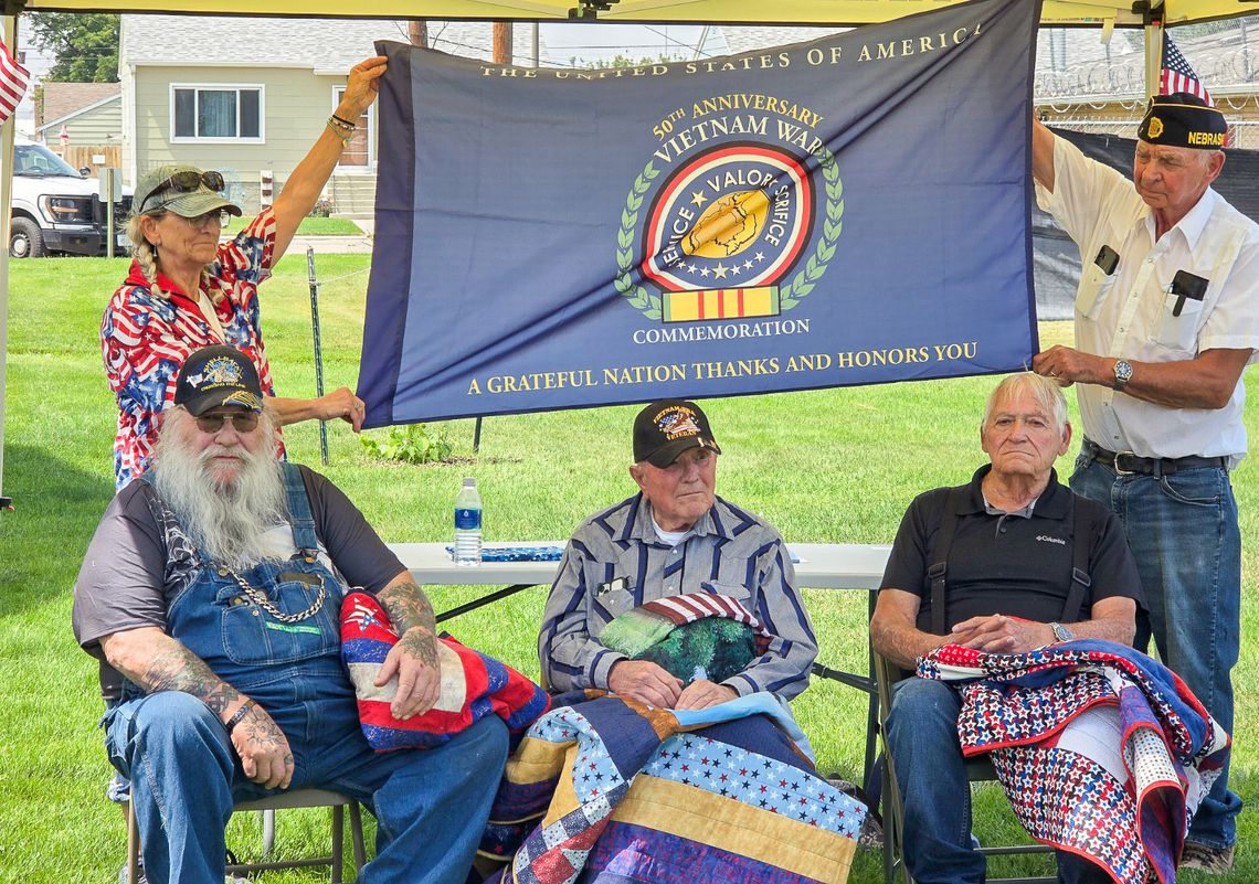 Three receive Quilts of Valor Three receive Quilts of Valor